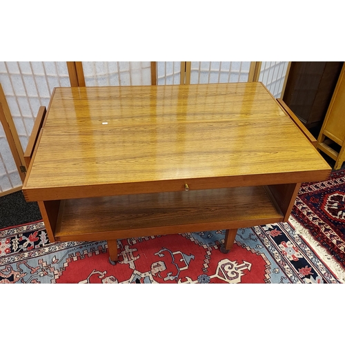 201 - A Mid century two tier serving/ hostess trolley table. [74x114x38cm]