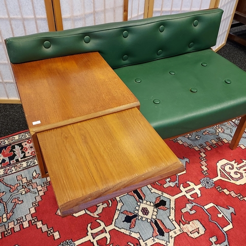 202 - A Mid century teak and faux green leather telephone table. [56x98x50cm]