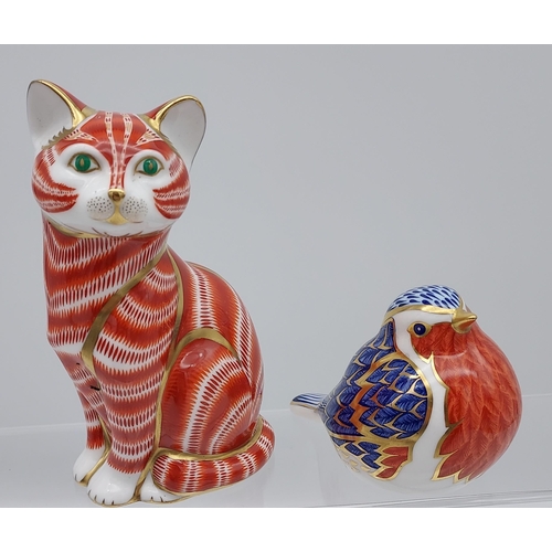 223 - A Royal Crown Derby cat figurine together with RCD Robin- [Robin as found]