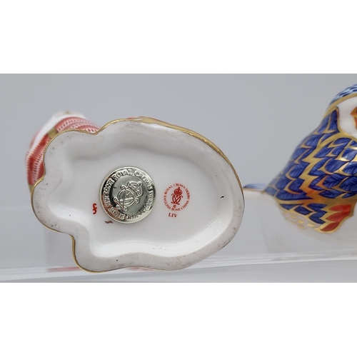 223 - A Royal Crown Derby cat figurine together with RCD Robin- [Robin as found]