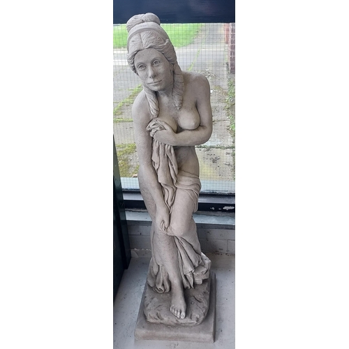 240 - A Large and heavy concrete garden sculpture of a semi nude lady/ god figurine. [95cm in height]