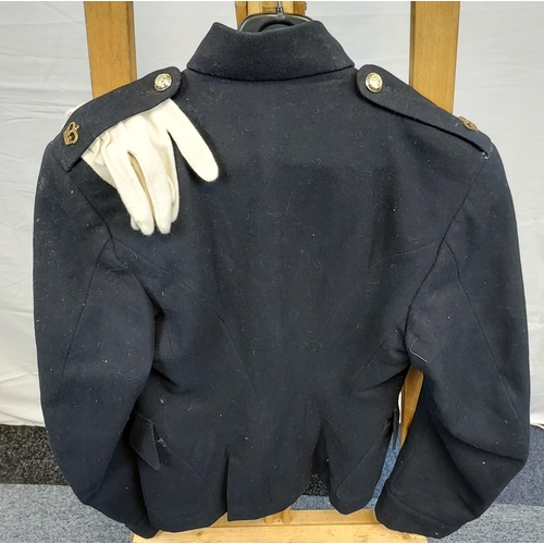 261 - A Military dress jacket with gloves.