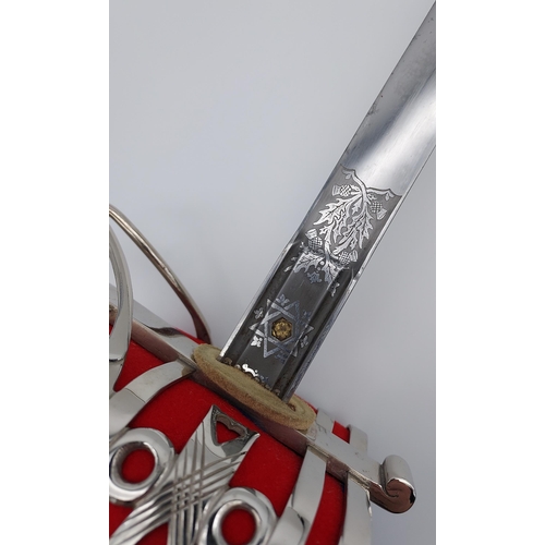 270 - A Military King George V Cavalry sword with scabbard. Produced by Henry Wilkinson Pall Mall London. ... 