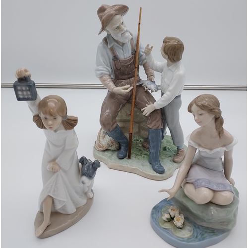 273 - Three various Lladro and Nao figurines to include BM17A and 6E57Z- as found.