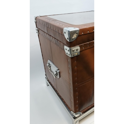 278 - A Contemporary faux leather case/ trunk. Sat upon a chrome pedestal base. [As found to top]