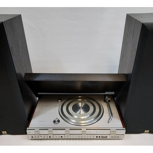 315 - A Vintage Bang & Olufsen Beocenter 3500 1972/76 model turn table together with a pair of floor stand... 