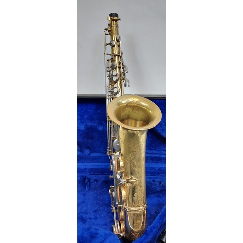 324A - A Vintage Kin Star Saxophone, comes with a fitted travel case.