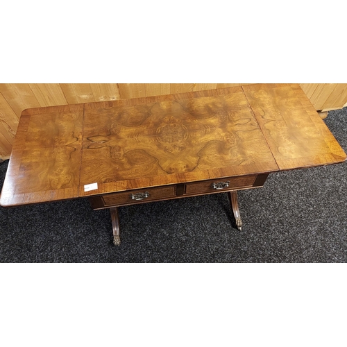 337 - A Reproduction drop end sofa table. [54x107x40cm]