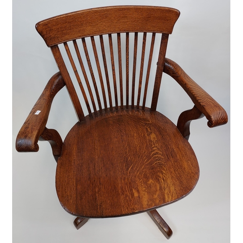 359 - A Nice example of an Antique captains arm chair made from oak. Mechanism produced by H.B & W Co.