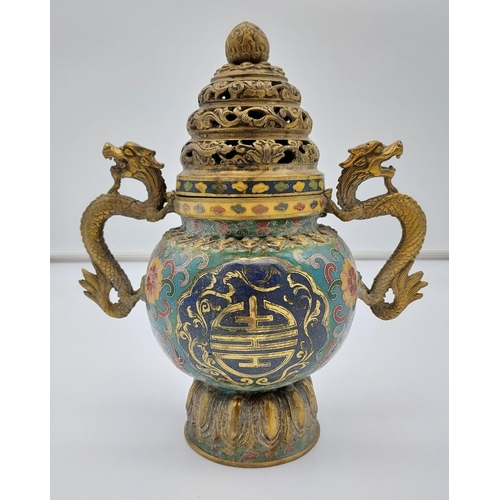 384 - A Chinese Ming Dynasty Bronze and Cloisonné incense burning pot with lid. Designed with ornate drago... 