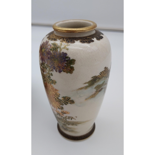 387 - A Japanese panel painted Satsuma temple jar, together with a Satsuma floral painted vase. [vase-12.5... 