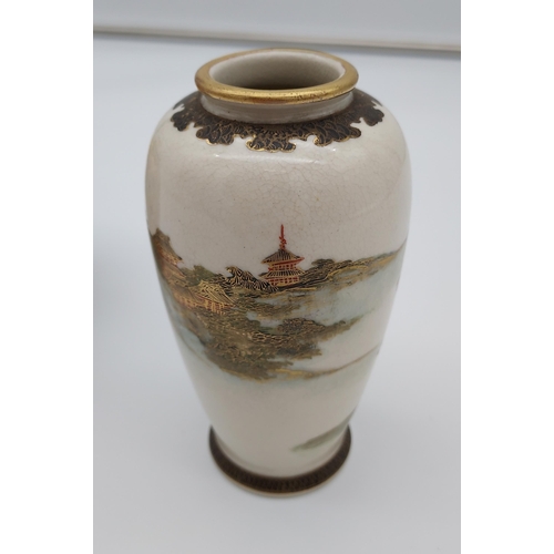 387 - A Japanese panel painted Satsuma temple jar, together with a Satsuma floral painted vase. [vase-12.5... 