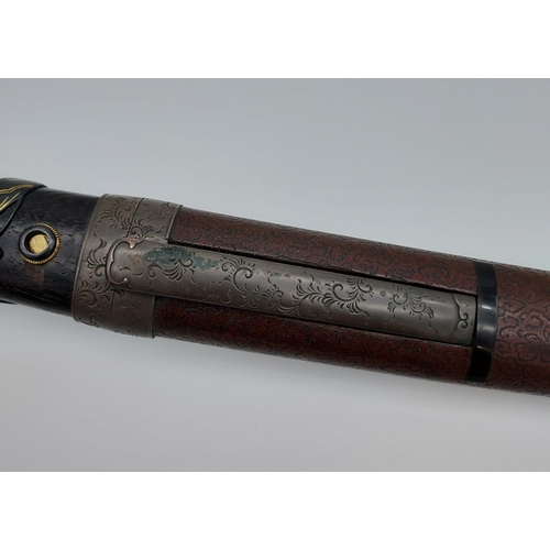 391 - An 18th/ 19th century Japanese Tanto blade. With original saya, Bronzed ornate mounts, two smaller b... 