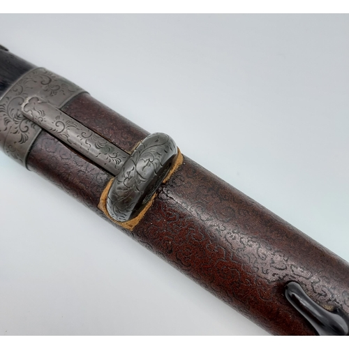 391 - An 18th/ 19th century Japanese Tanto blade. With original saya, Bronzed ornate mounts, two smaller b... 