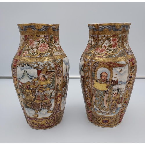 394 - A Pair of late 19th/ early 20th century Japanese Satsuma hand painted panel vases. Depicting various... 