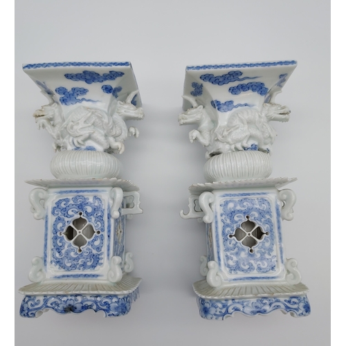 395 - A Pair of Chinese Blue and white pattern dragon vases. [17cm in height]