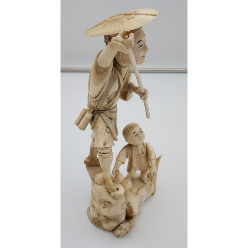 408 - A large 19th century Japanese Ivory figure of an elderly gentleman and child. Signed to the base. [2... 