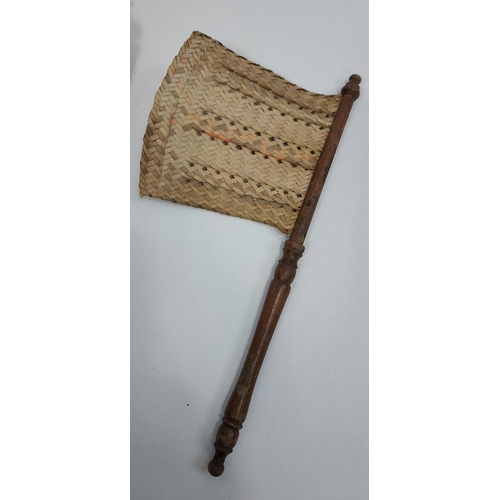 418 - Tribal leather, weaved carry bag and swat/ brush?