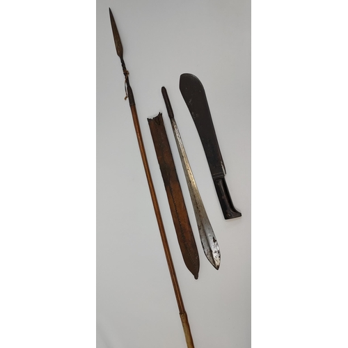 426 - A Lot of three native weapons to include spear, jungle machete and tribal double edge sword with lea... 