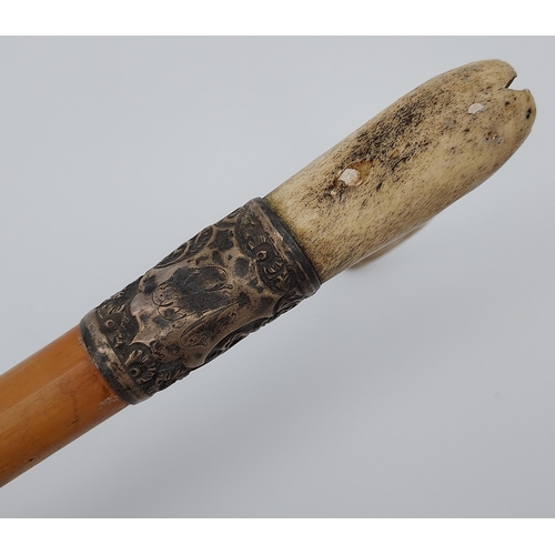 432 - Antique riding crop, antler handle with a silver mount and Malacca shaft. [82cm in length]