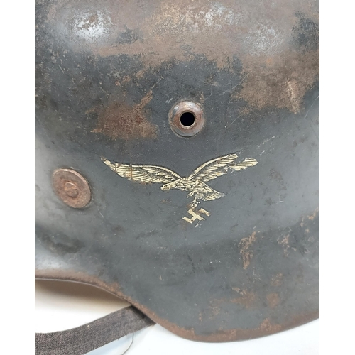 436 - A WW2 German Nazi Lufftwaffe helmet.