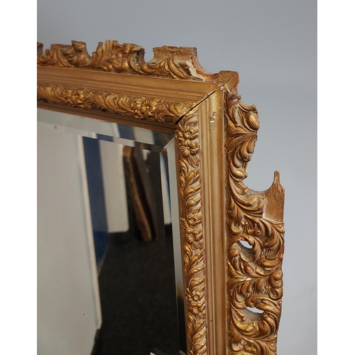 465 - A Heavy 19th century gilt framed full length mirror. [Damage to frame in areas] [142x60cm]