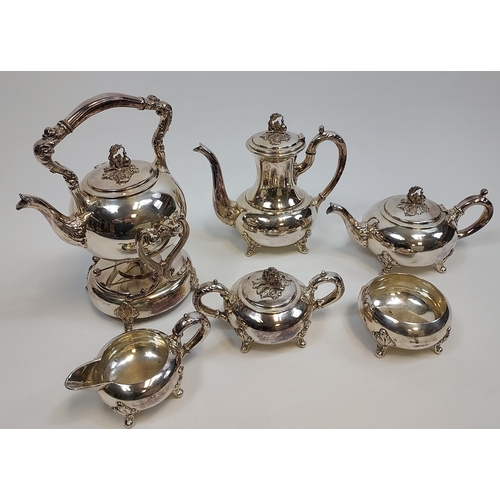 478 - A Six piece silver on copper tea/ coffee service with a spirit kettle