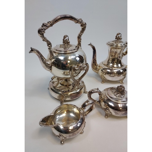 478 - A Six piece silver on copper tea/ coffee service with a spirit kettle