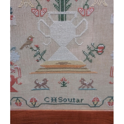 484 - A 19th century framed sampler by C H Soutar. [56x44cm]