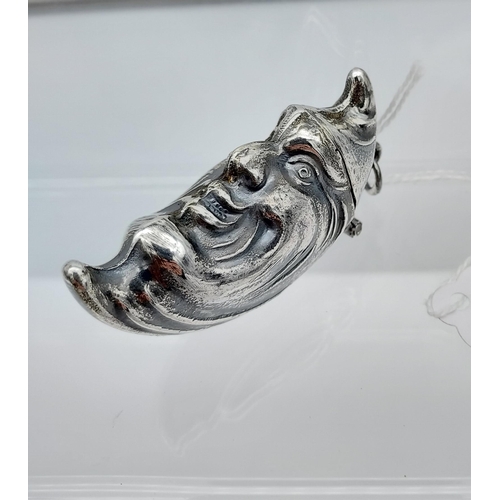 523 - A silver plated vesta case in the form of a half moon [18.72g] [5.5CM IN LENGTH]