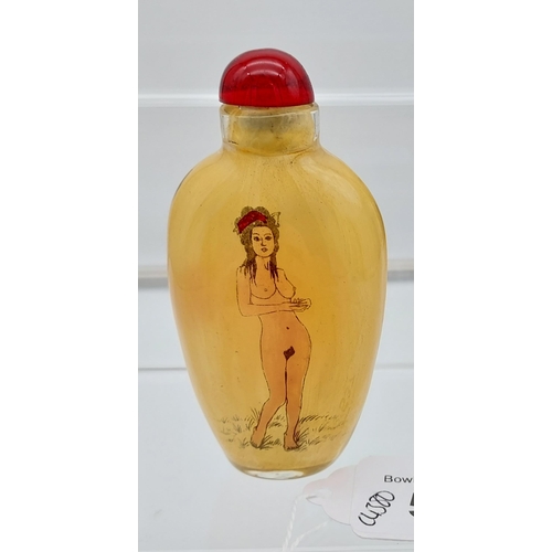 537 - A Chinese hand painted glass perfume bottle showing two nude figures to each side.