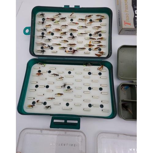 54 - A large selection of fishing flies, fly boxes and fly line.