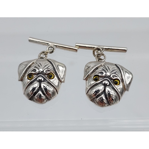 540 - A pair of silver dogs head cufflinks [4.43g]