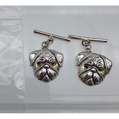 540 - A pair of silver dogs head cufflinks [4.43g]