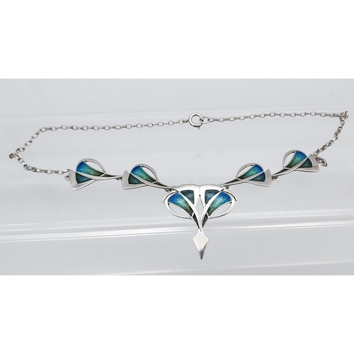 557 - A Lovely example of a silver and enamel pendant/ necklace in an art nouveau form, together with a si... 