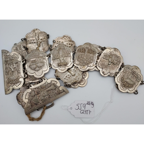 559 - An Indian ornate silver belt. [206.90grams]