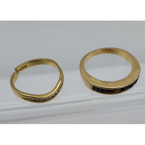 566 - A Lot of two scrap gold 9ct gold rings. Contains diamond cluster and sapphire stones. [7.53grams]