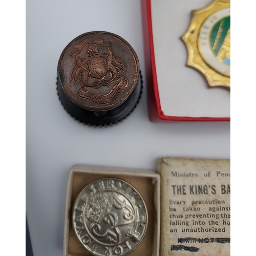 66 - A Selection of military collectables to include The Kings Badge with box, Pingat Jasa miniature meda... 