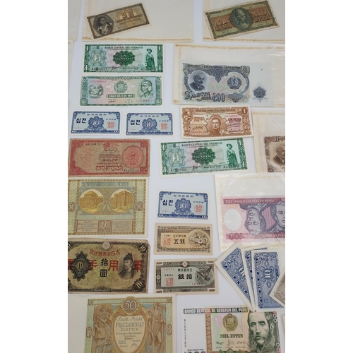 71 - A Collection of old foreign banknotes