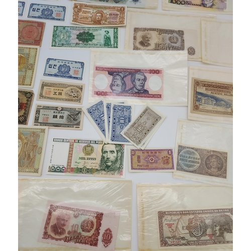 71 - A Collection of old foreign banknotes