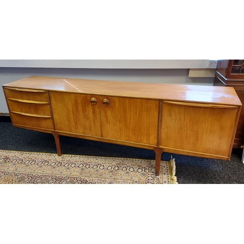 89 - A Mid century Teak pedestal sideboard produced by A.H. McIntosh & co Ltd. [76x213x45cm]