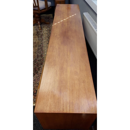 89 - A Mid century Teak pedestal sideboard produced by A.H. McIntosh & co Ltd. [76x213x45cm]