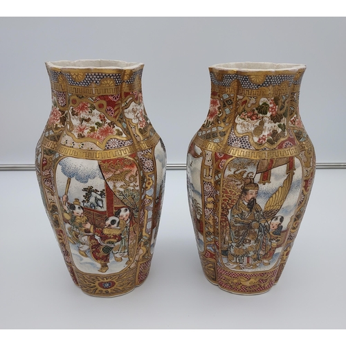 394 - A Pair of late 19th/ early 20th century Japanese Satsuma hand painted panel vases. Depicting various... 