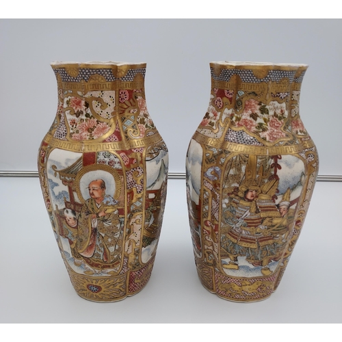 394 - A Pair of late 19th/ early 20th century Japanese Satsuma hand painted panel vases. Depicting various... 