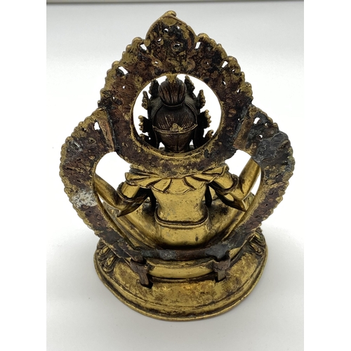 108 - Antique gilt bronze/brass Tibetan Buddhism deity. [19cm in height]