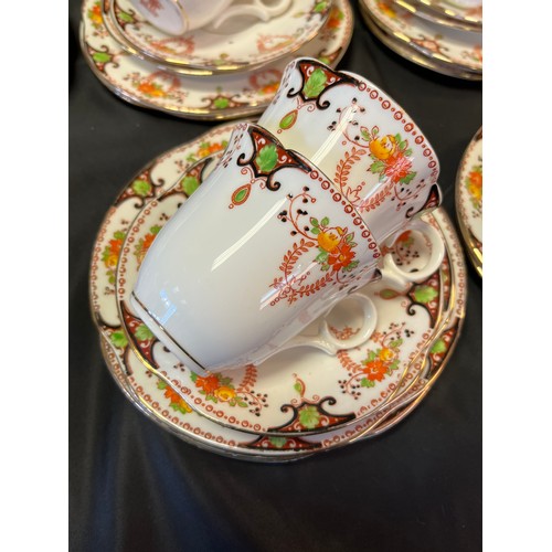 153A - A Vintage Victoria C&E 38 Piece tea set.