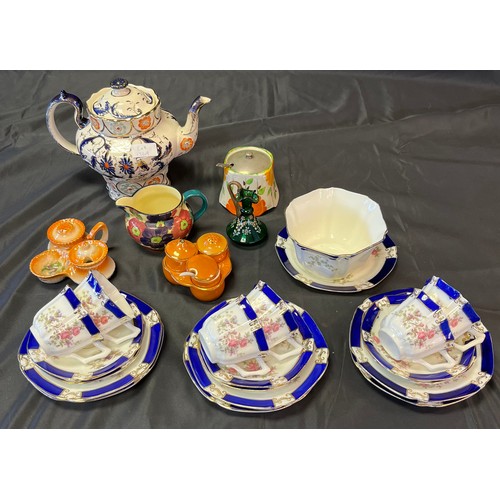 156A - A Quantity of porcelain collectables to include ornate tea pot, cruet sets, floral design part tea s... 