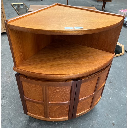 120 - A Mid century teak Parker Knoll corner cabinet.