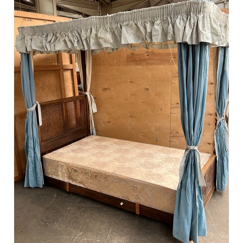 272 - A 19th century 3/4 Mahogany framed, barley twist four poster bed with blue drapes.