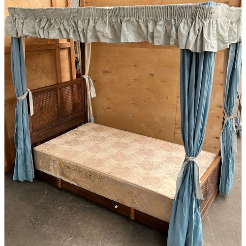 272 - A 19th century 3/4 Mahogany framed, barley twist four poster bed with blue drapes.